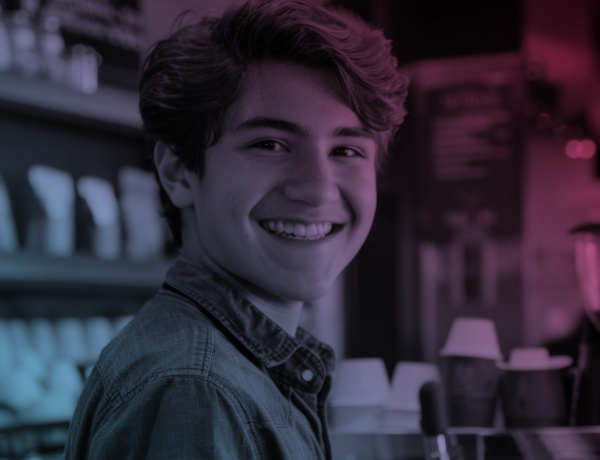 teen male working at coffee shop