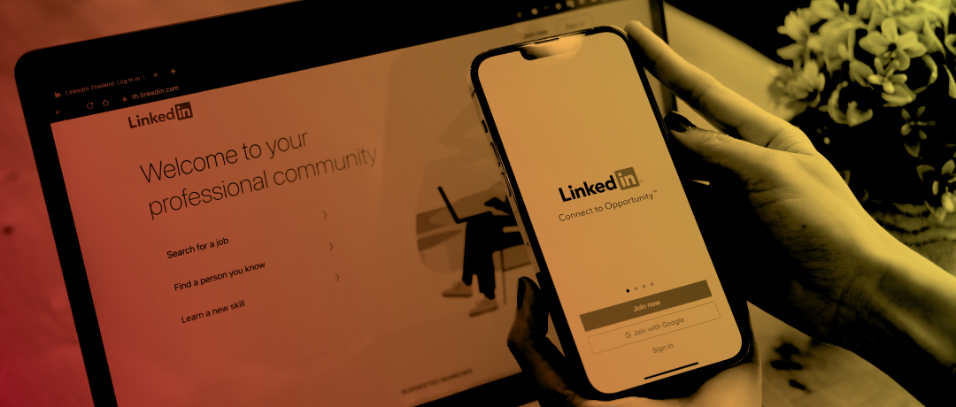 phone and laptop displaying linkedin