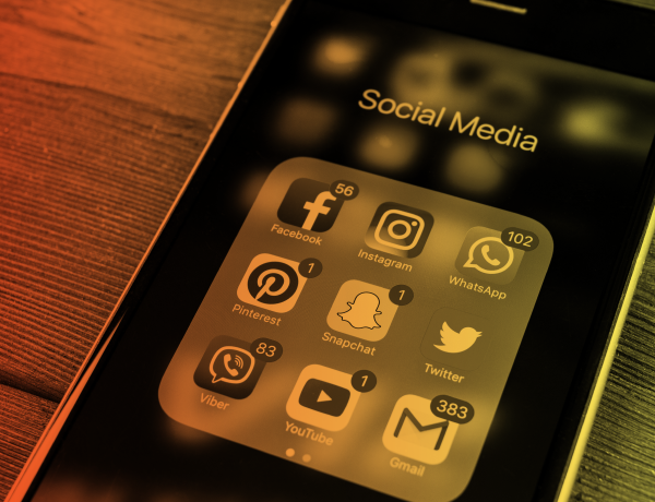 cellphone with social icons on the screen