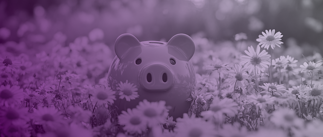 piggy banking in a field of spring flowers