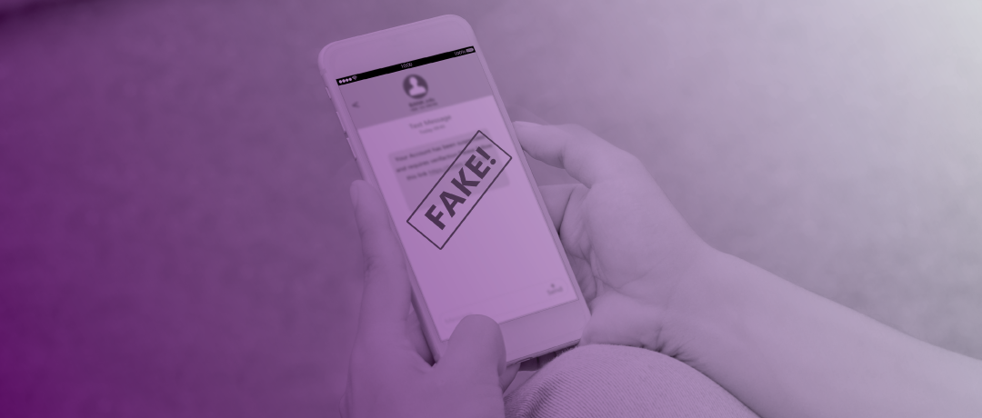 phone showing fraud text