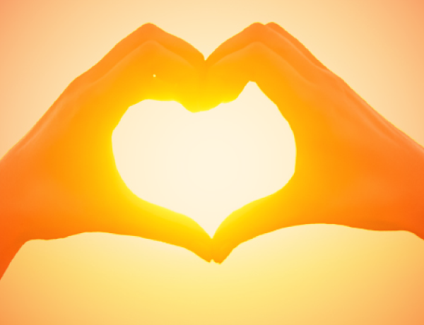 hand heart around sun