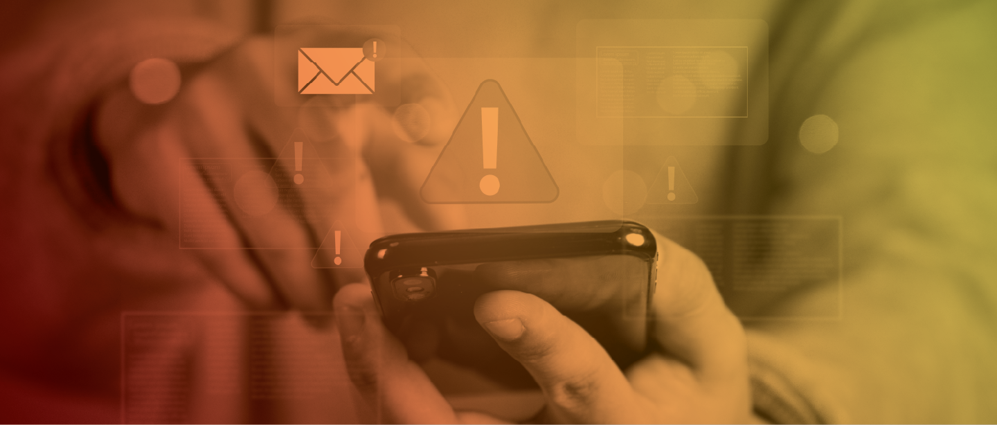 man receiving scam messages on his phone