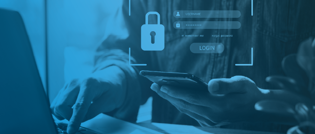 person using laptop and phone with secure lock on